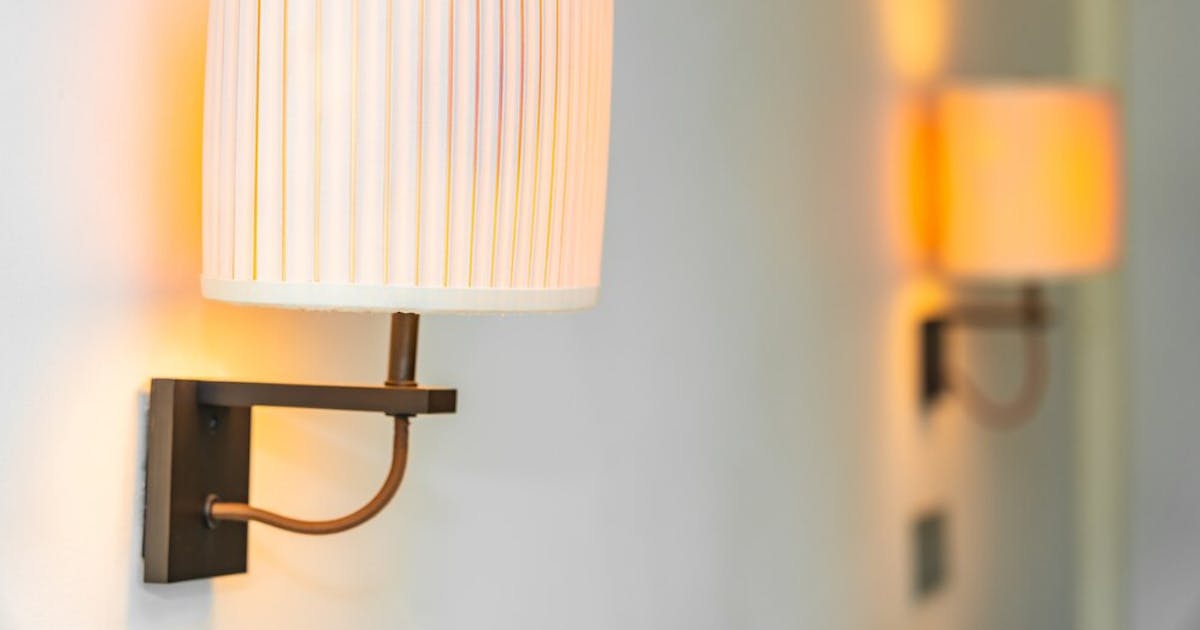 Why are Up-and-Down wall lights suitable for indoor and outdoor lighting?